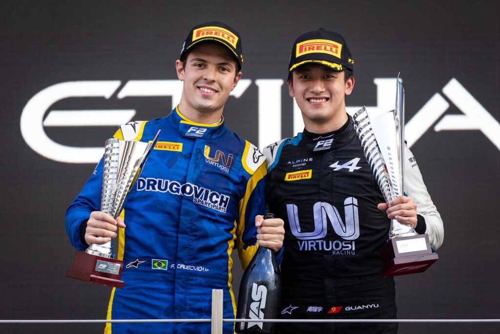 Felipe drugovich and Zhou podium